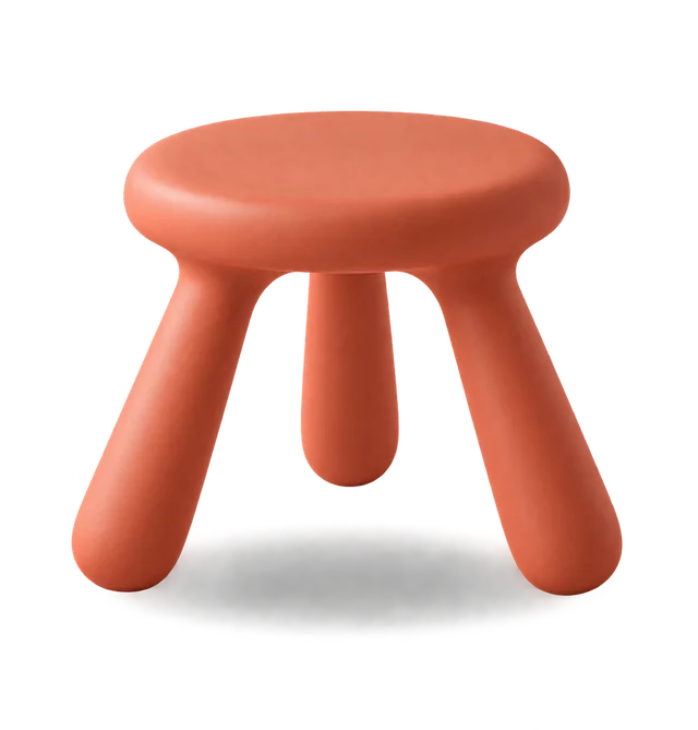 Coral stool standing in a hand drawn cardboard box
